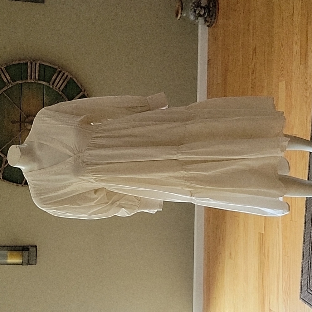 Urban Outfitters tiered long sleeve cotton dress with a hi low hem
